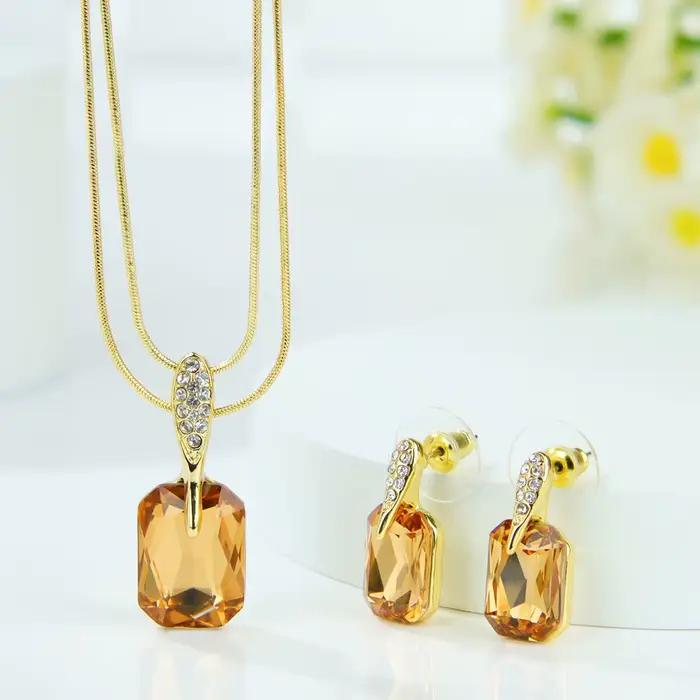 Collier et boucles d'oreilles en pierre naturelle en forme de goutte d'eau