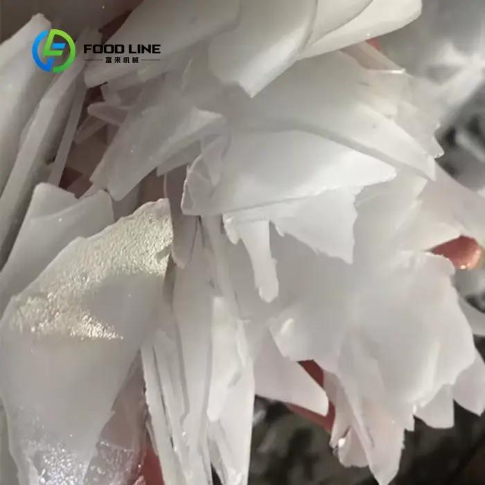 Machine à glace en flocons industrielle et commerciale personnalisée de 10 000 kg à 50 000 kg, à économie d'énergie, pour la production de glace cristalline pour la transformation et le stockage à fro