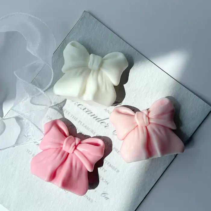 Bougie aromatique tridimensionnelle avec nœud papillon 3D