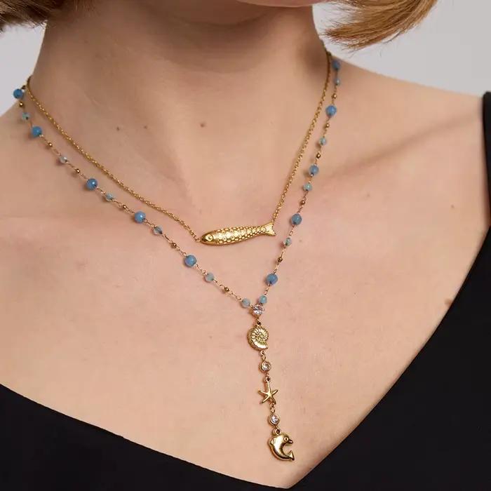 Collier Pendentif Étoile de Mer et Conque en Zirconium