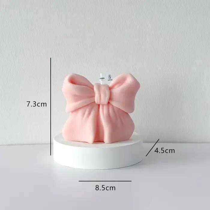 Bougie aromatique tridimensionnelle avec nœud papillon 3D
