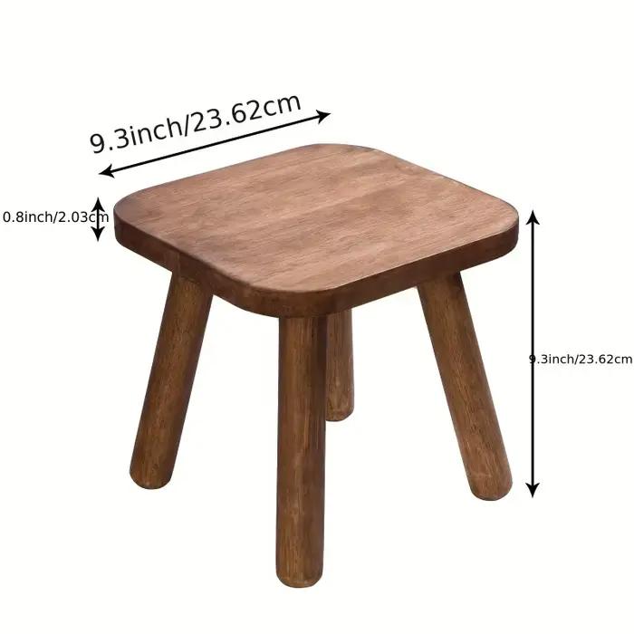 Petit tabouret en bois, bien équilibré, avec une finition en noyer foncé naturel, design simple, adapté à la maison, au bureau ou pour l'exposition de plantes.