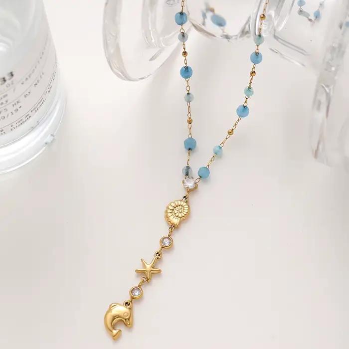 Collier Pendentif Étoile de Mer et Conque en Zirconium