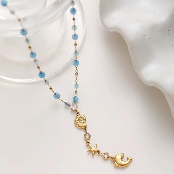 Collier Pendentif Étoile de Mer et Conque en Zirconium